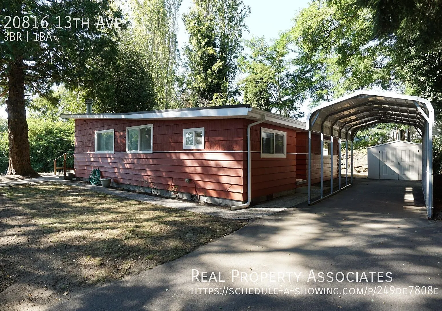Large Three Bedroom Home with Two Fireplaces and a Carport — Photo 1