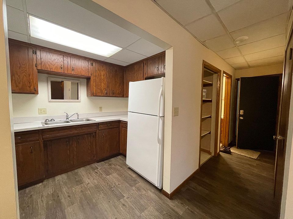 Kitchen - with closets and entry way to the right.