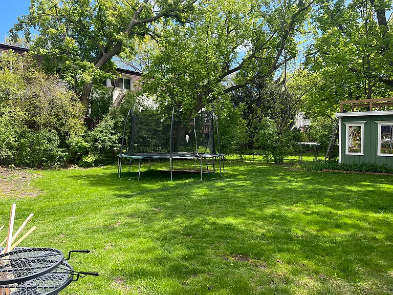 Play area with trampoline