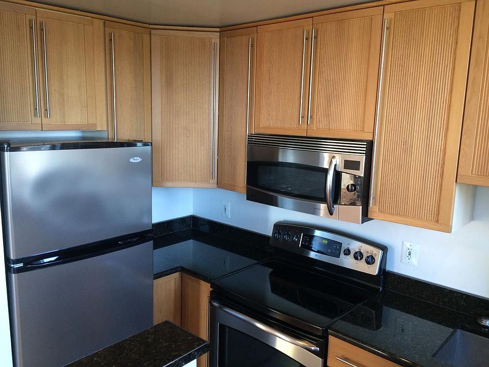 Kitchen with granite countertops and stainless appliances