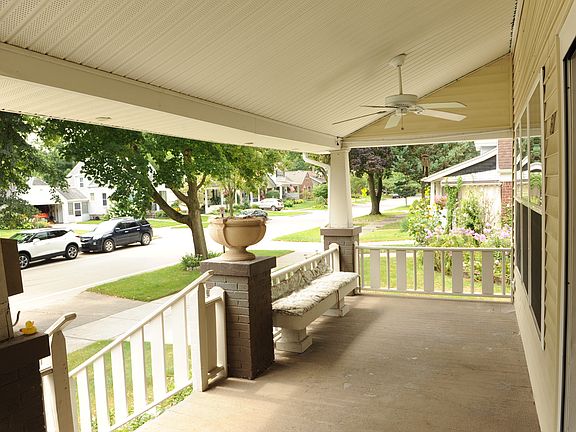 Front porch with ceiling fan