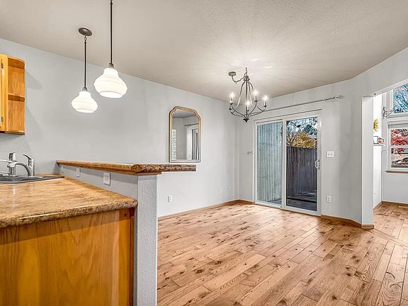 Dining area off the kitchen and near the sliding doors to backyard patio.