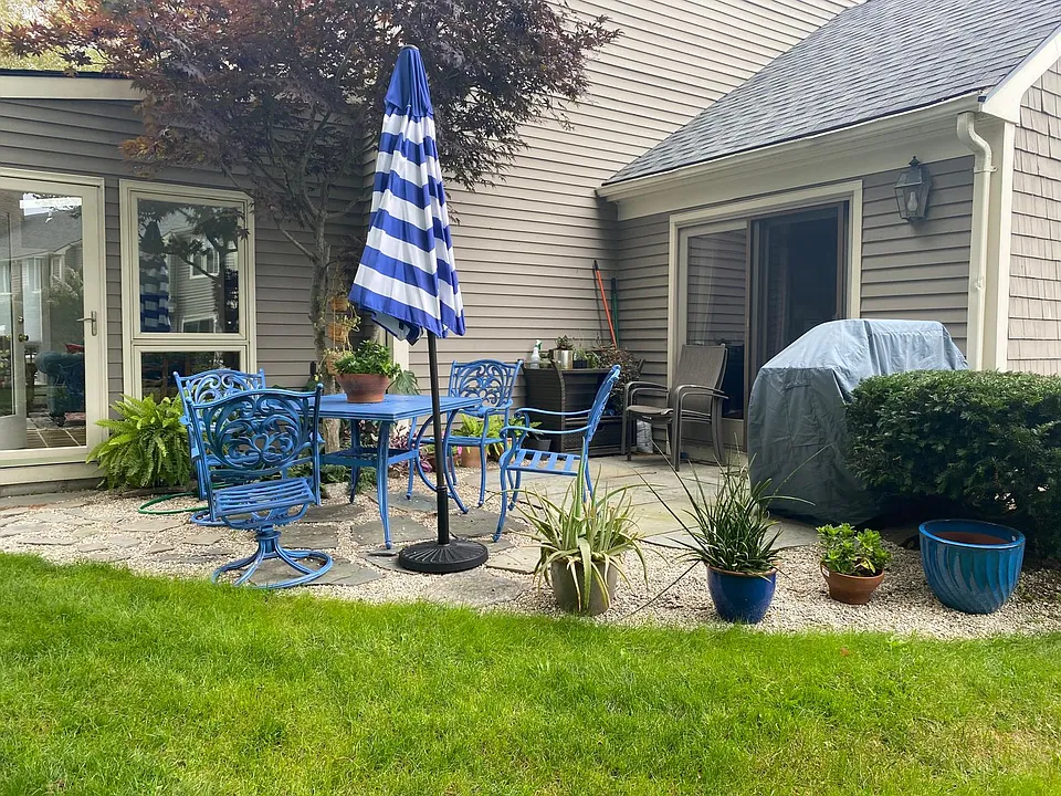 Patio outside sunroom and first floor bedroom