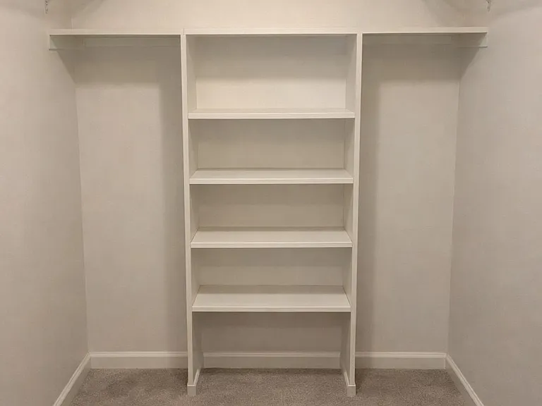 Master Bedroom Walk-In Closet accessed via Master Bathroom (Approx. 11 x 5)