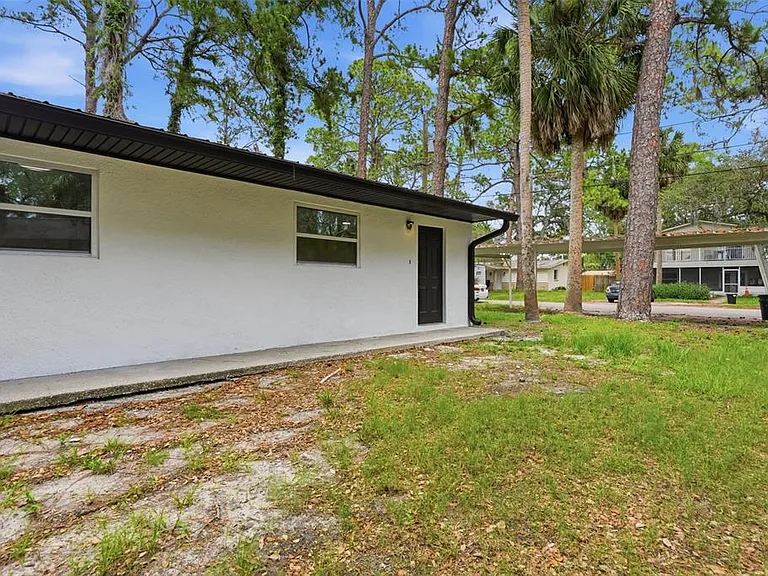 7133 Pinewood Dr — Photo 1