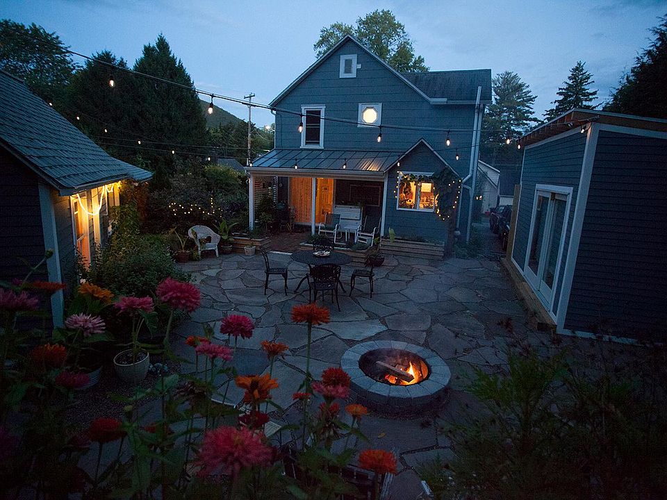 The beautiful backyard patio and fire pit will make coming home feel like you are on vacation!