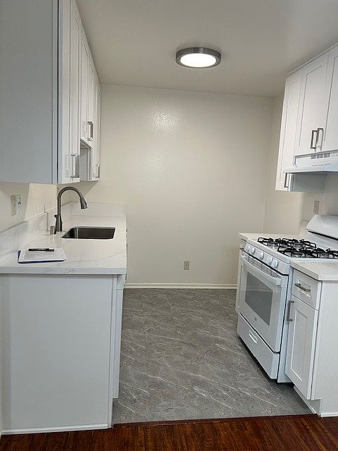 New Kitchen Cabinets, floors and fixtures