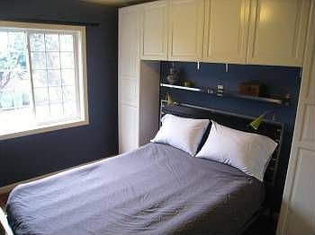 Light and bright bedroom with built-ins