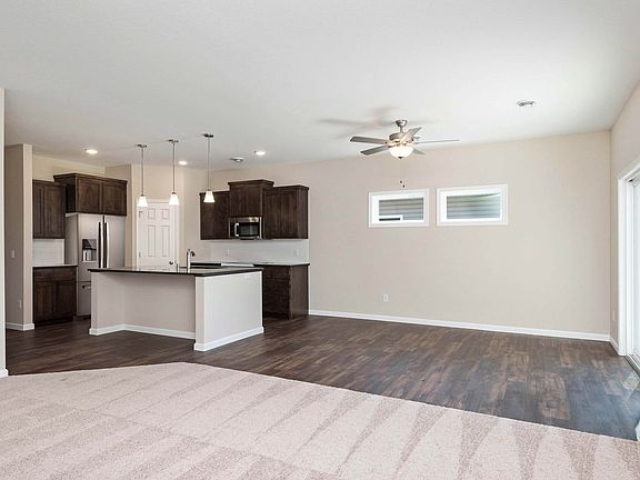 You will enjoy multiple spaces for entertaining family and friends in this amazing new home