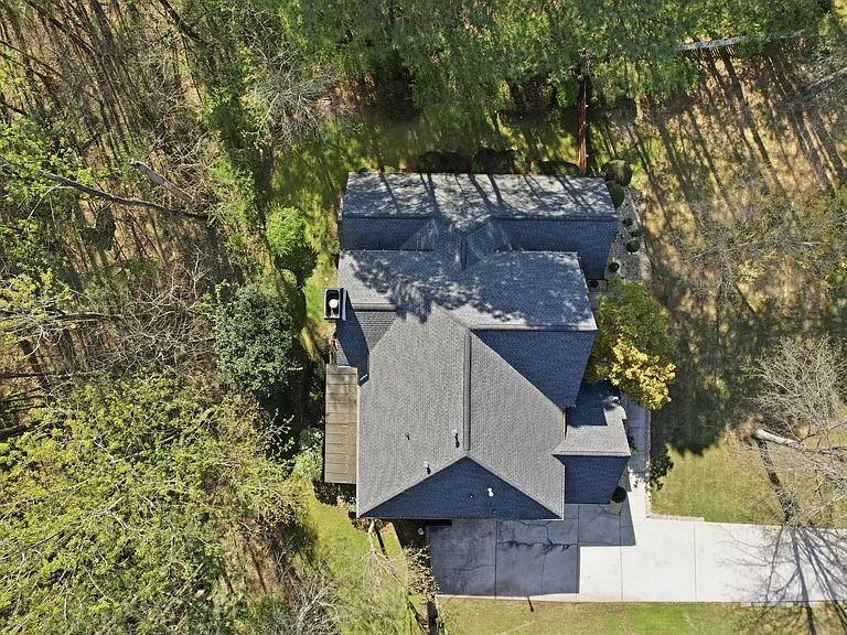 Aerial perspective showing the home's footprint and surrounding lot