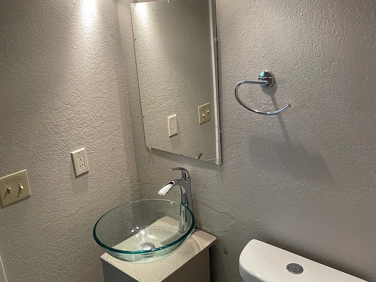 Main level half bathroom.