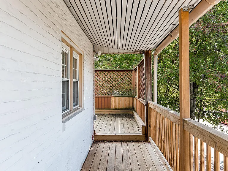 2nd floor porch leading to roofdeck.