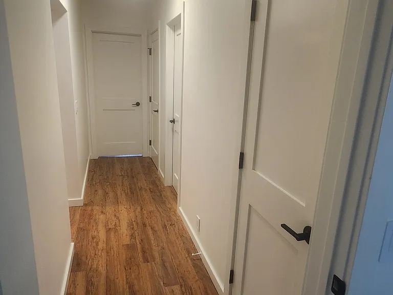 Upstairs hallway to two bedrooms, bathroom and tow large linen closets