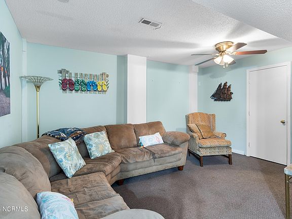 5th image of 2302 E Oak Island Drive