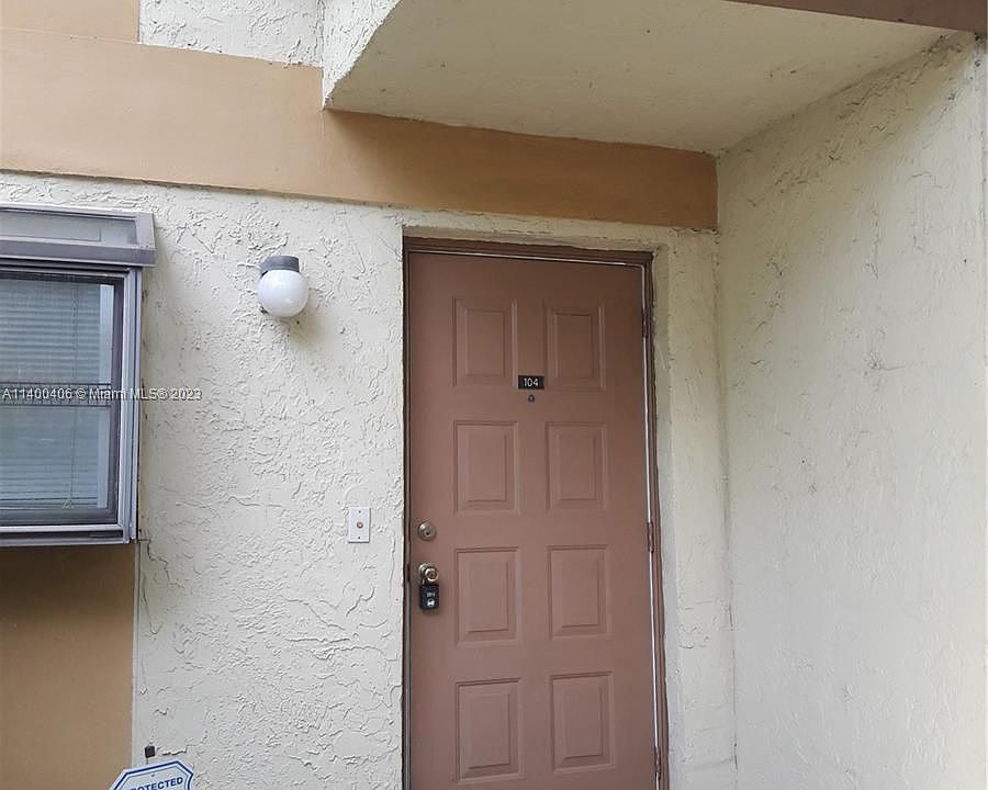 1st image of 411 Gardens Dr APT 104