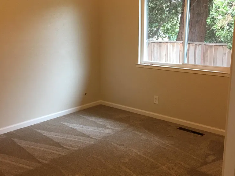 Rear bedroom facing backyard