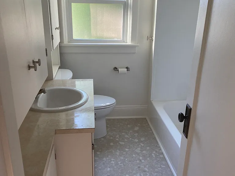 Bathroom with brand new toilet