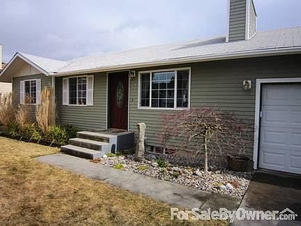 Exterior Front Door
						:
						Vinyl siding and custom landscaping including a beautiful Japanese Maple.