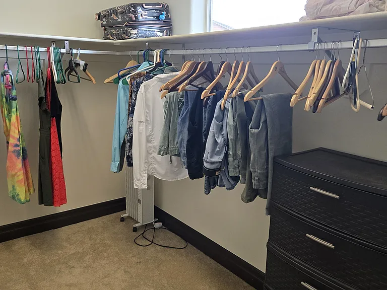 Huge walk in closet in master bedroom