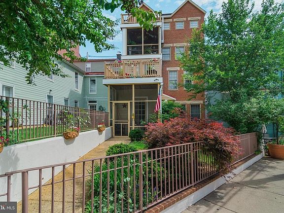 Rear of 181 Prince George Street with roof deck visible