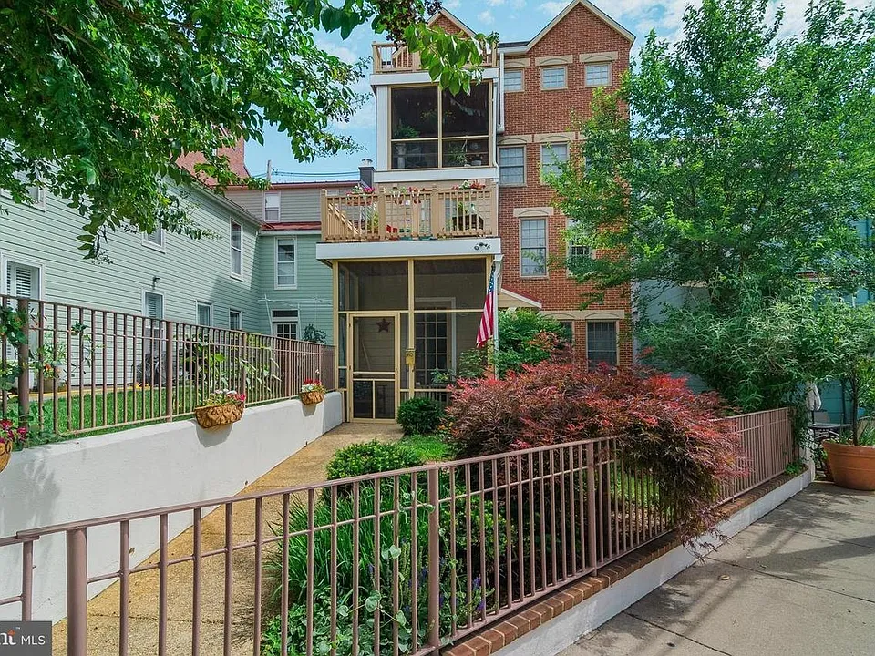 Rear of 181 Prince George Street with roof deck visible