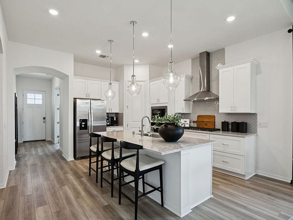 Bright and Open Kitchen with Built In Appliances