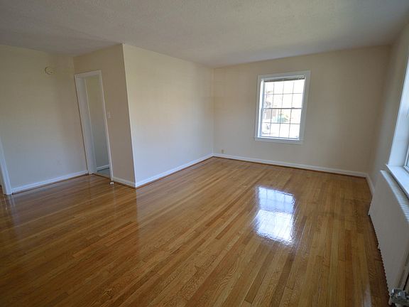 This is the living room - with table space for dining. Bright with lots of windows