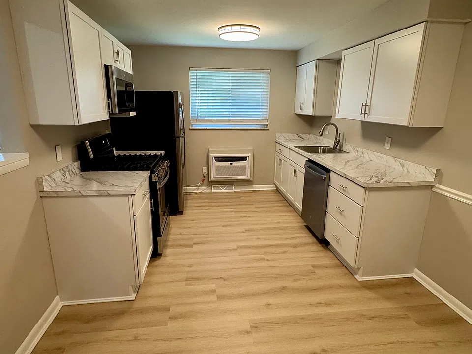 The kitchen was remodeled down to the studs in 2026 with LVP floors, brand new appliances, and all new cabinets and counter tops