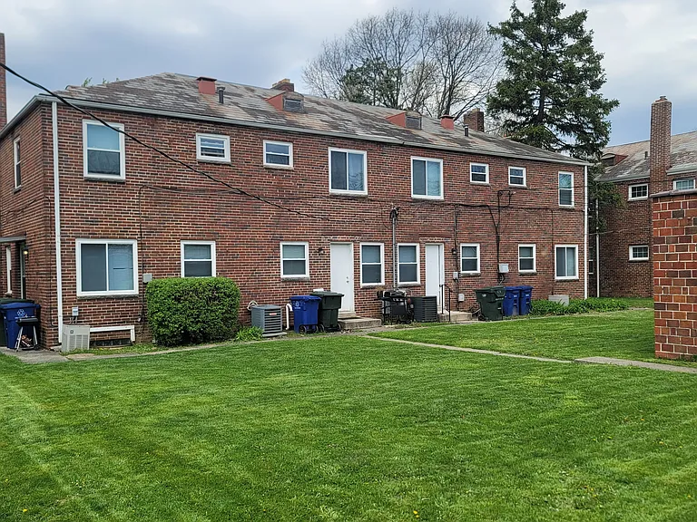 View of Backyard.
Building Has Updated Vinyl Windows. Reserved Parking for Each Unit in the Back.