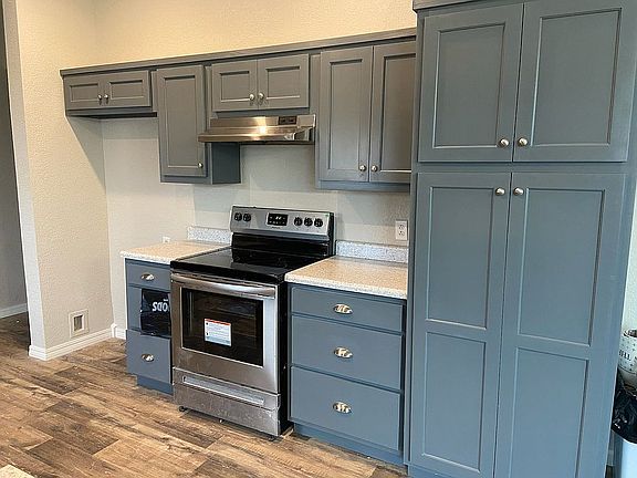 Stainless, smooth top range