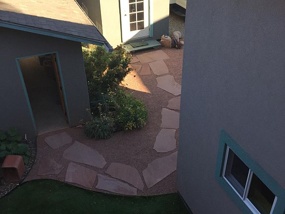 View of yard & storage shed from deck