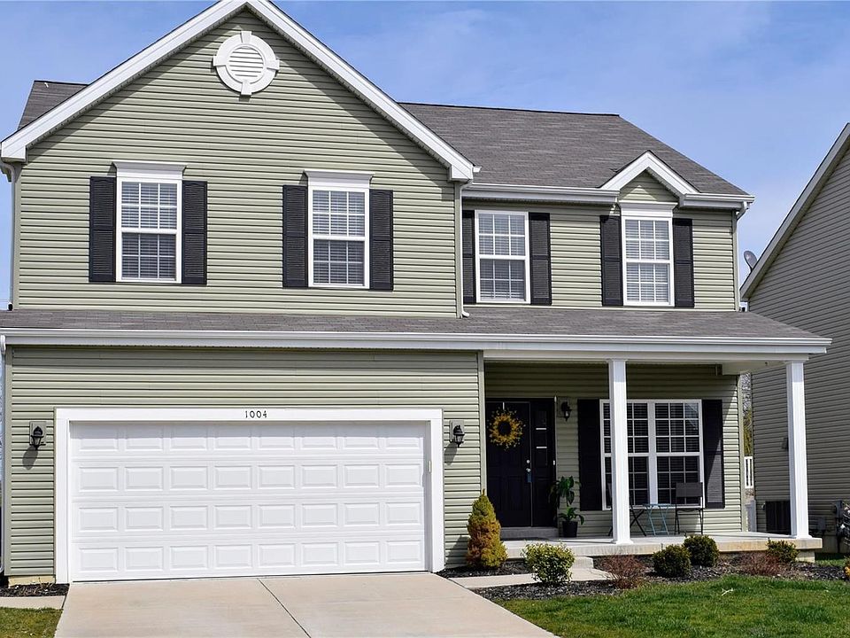 Welcome Home to this LIKE NEW HOME at 1004 Ashfield Lane Drive