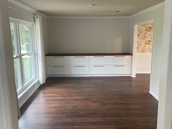 Front room with built-ins
