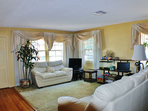 Living Room Opens to Dining