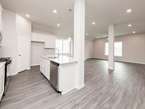 Kitchen to Dining Area and Family Room