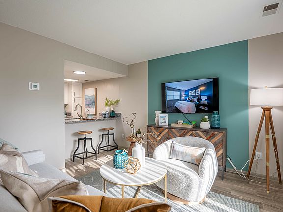 Spacious living room with hardwood-style flooring