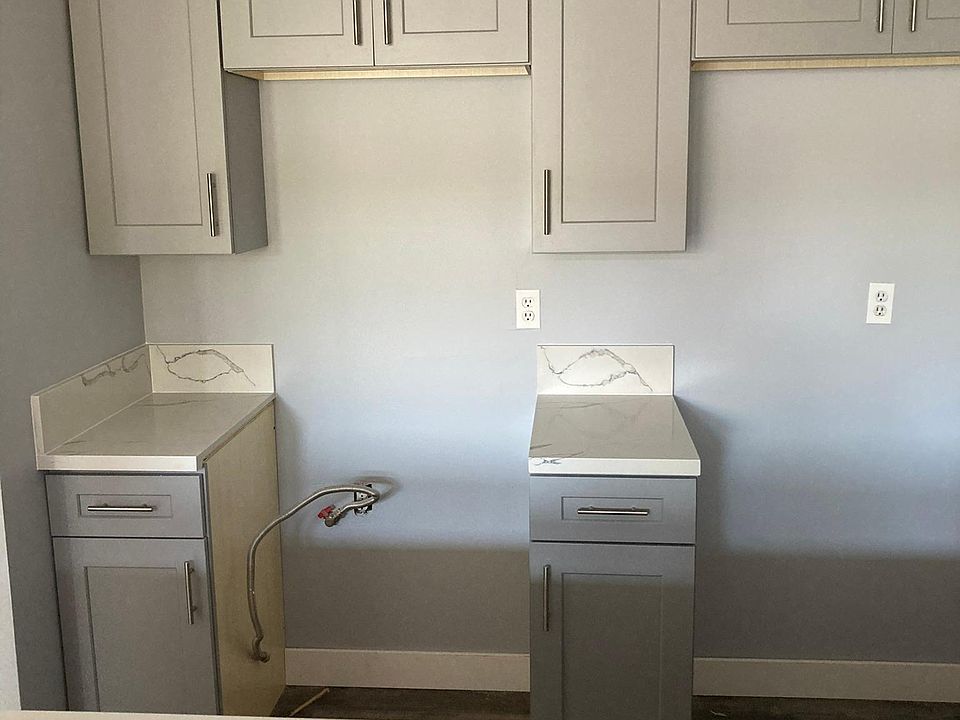 New kitchen cabinets, sink & stove