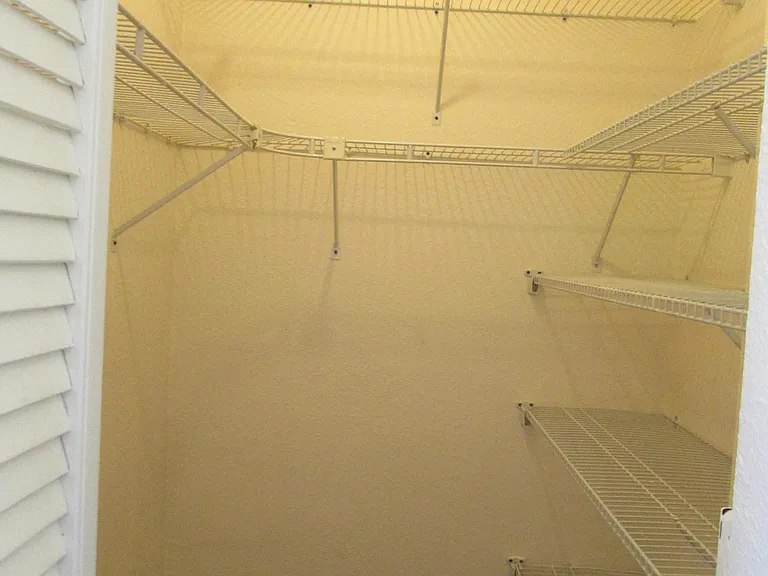 Walk-in closet in bedroom.