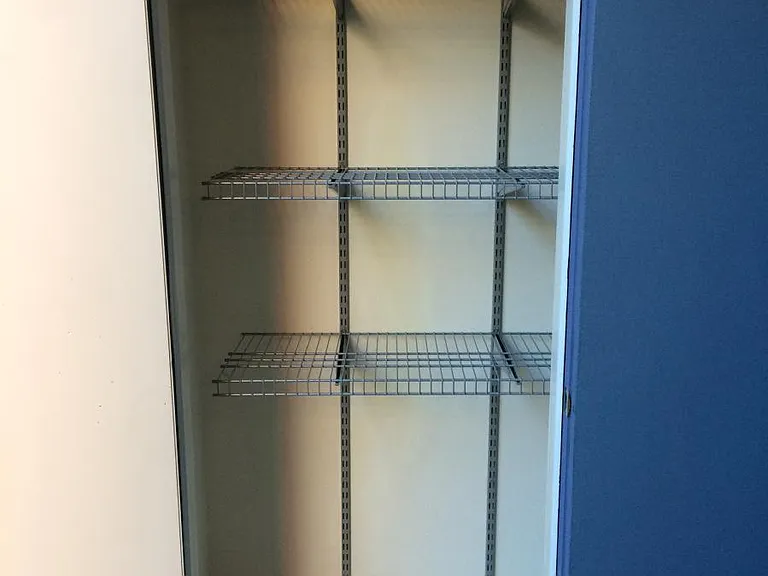 Finished patio storage closet with heavy duty shelving