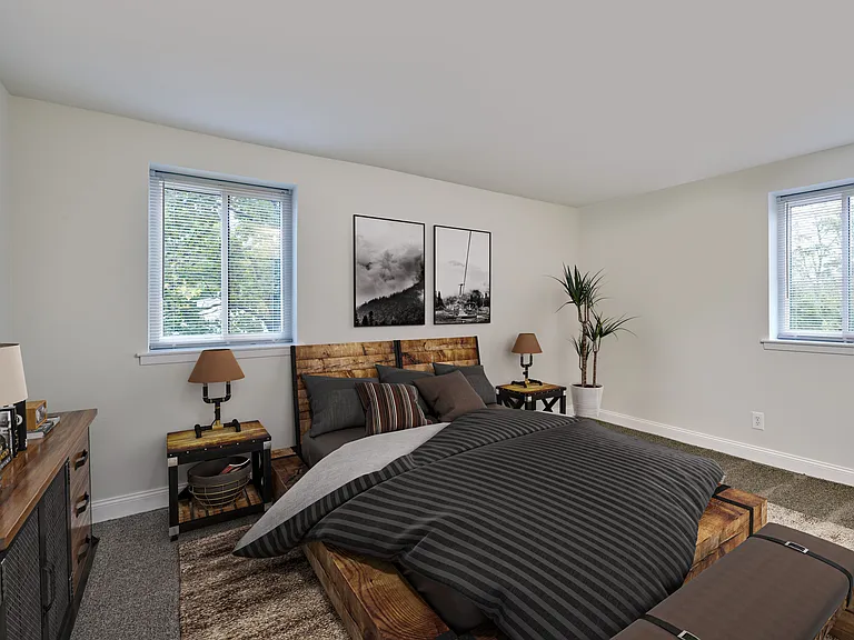 Natural light soaks this Bedroom Room