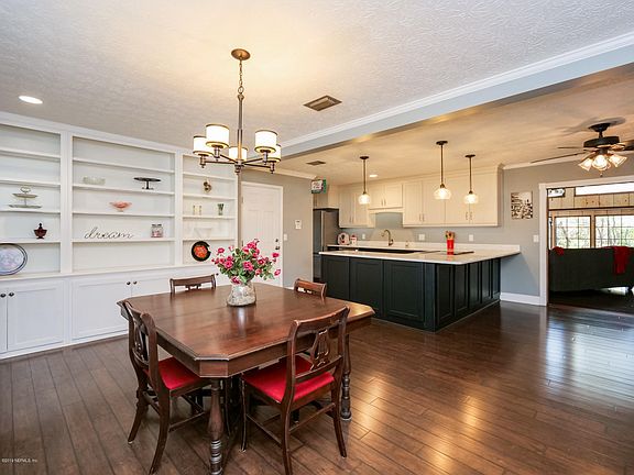 Dining area looking into kitchen