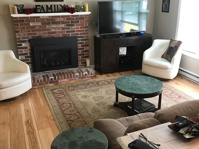 Upstairs living-room with hardwood floors.