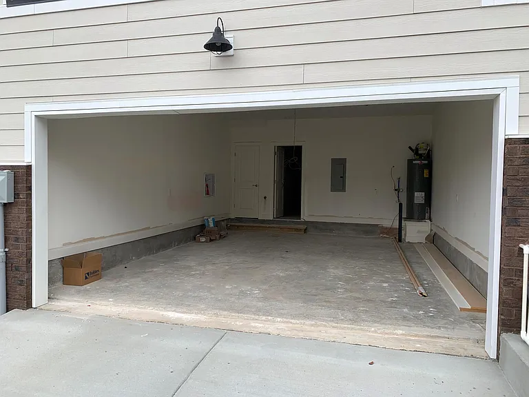 2 car garage with parking on the driveway