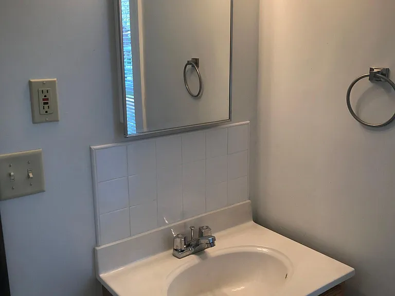 Bathroom sink, vanity and medicine cabinet