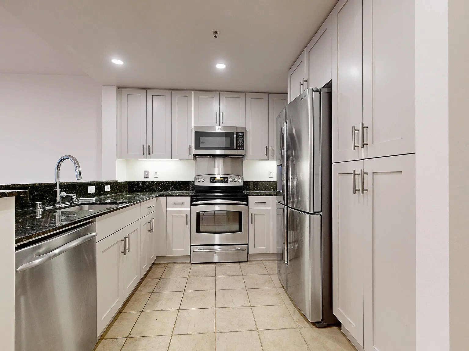 Spacious Two-Level Condo with EV Parking Included — Photo 3