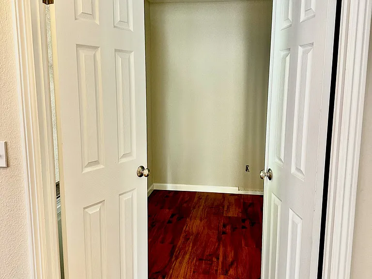 Downstairs bedroom with double doors