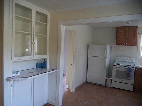 Kitchen with door to mud room and Harper street entry