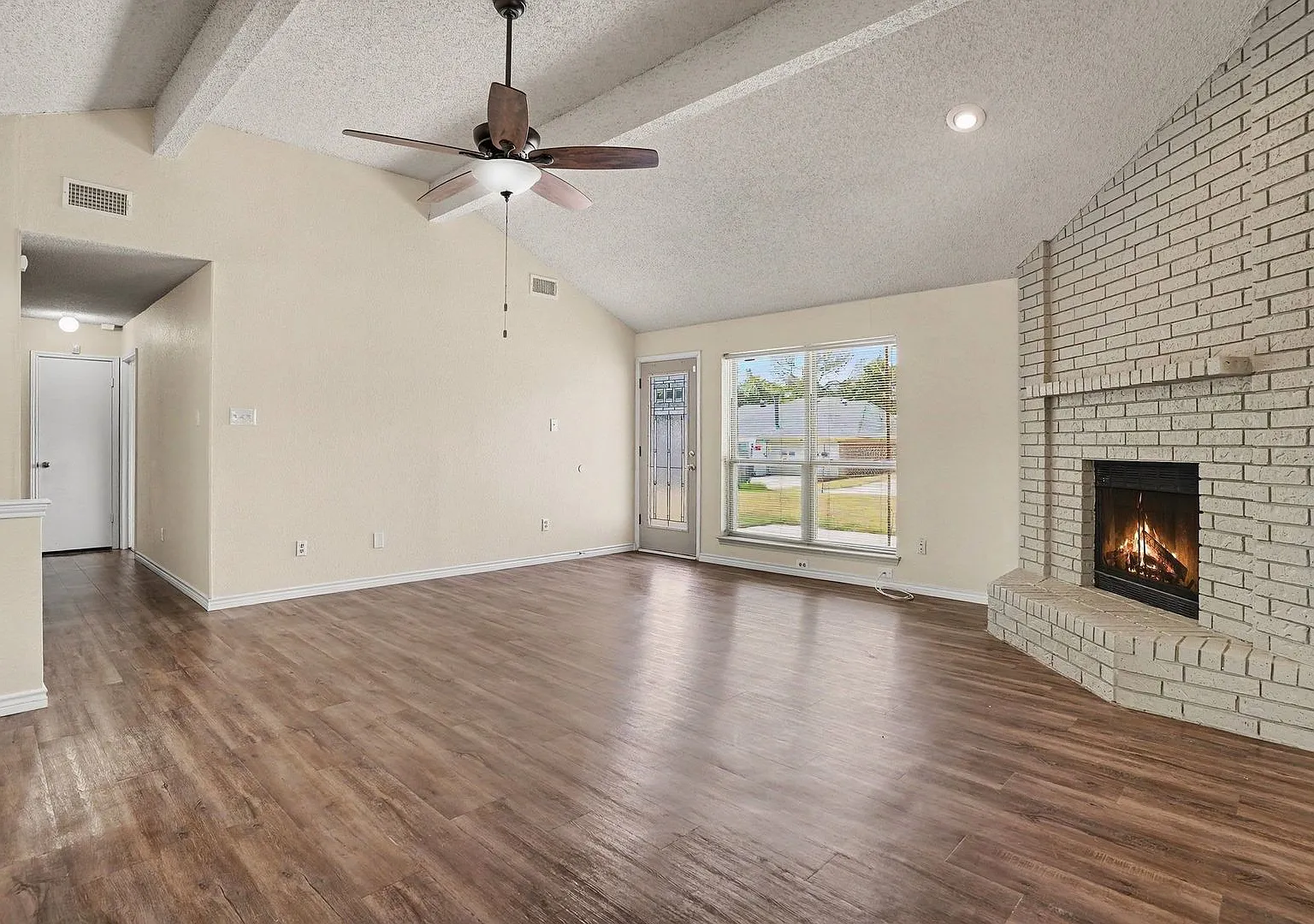 Spacious Single-Story Home with Fireplace, Large Backyard & 2-Car Garage — Photo 4