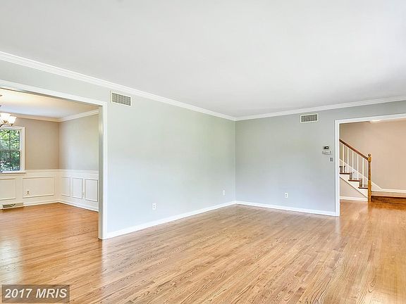 Lustrous Hardwood Floors / Seamless Room Flow