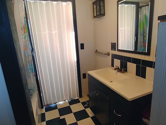 Accordion door in bathroom